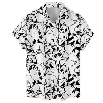 Close front view of the raccoon pattern and open collar on a black and white Hawaiian shirt