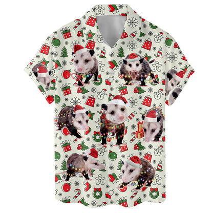 Front view of a festive opossum shirt with Santa hats, ornaments, gifts, and Christmas trees