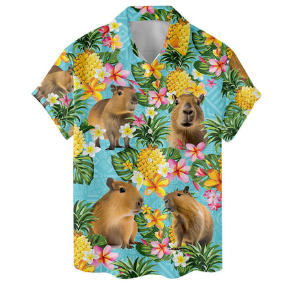 Front view of a capybara Hawaiian shirt featuring pineapples, flowers, and green leaves