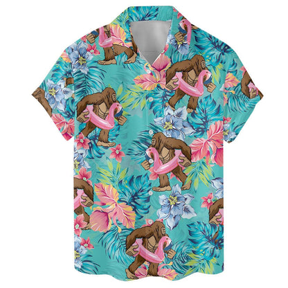 Turquoise Hawaiian shirt showing the playful ape and pink flamingo tropical pattern
