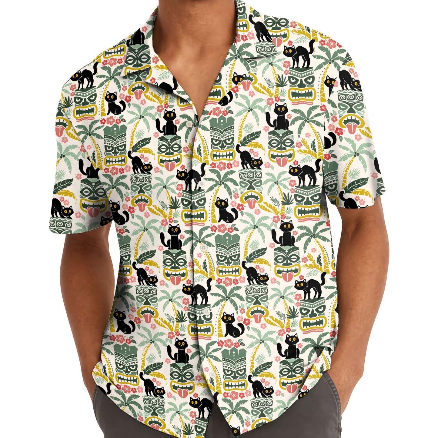 Model wearing the black cat tiki Hawaiian shirt with hands in pockets