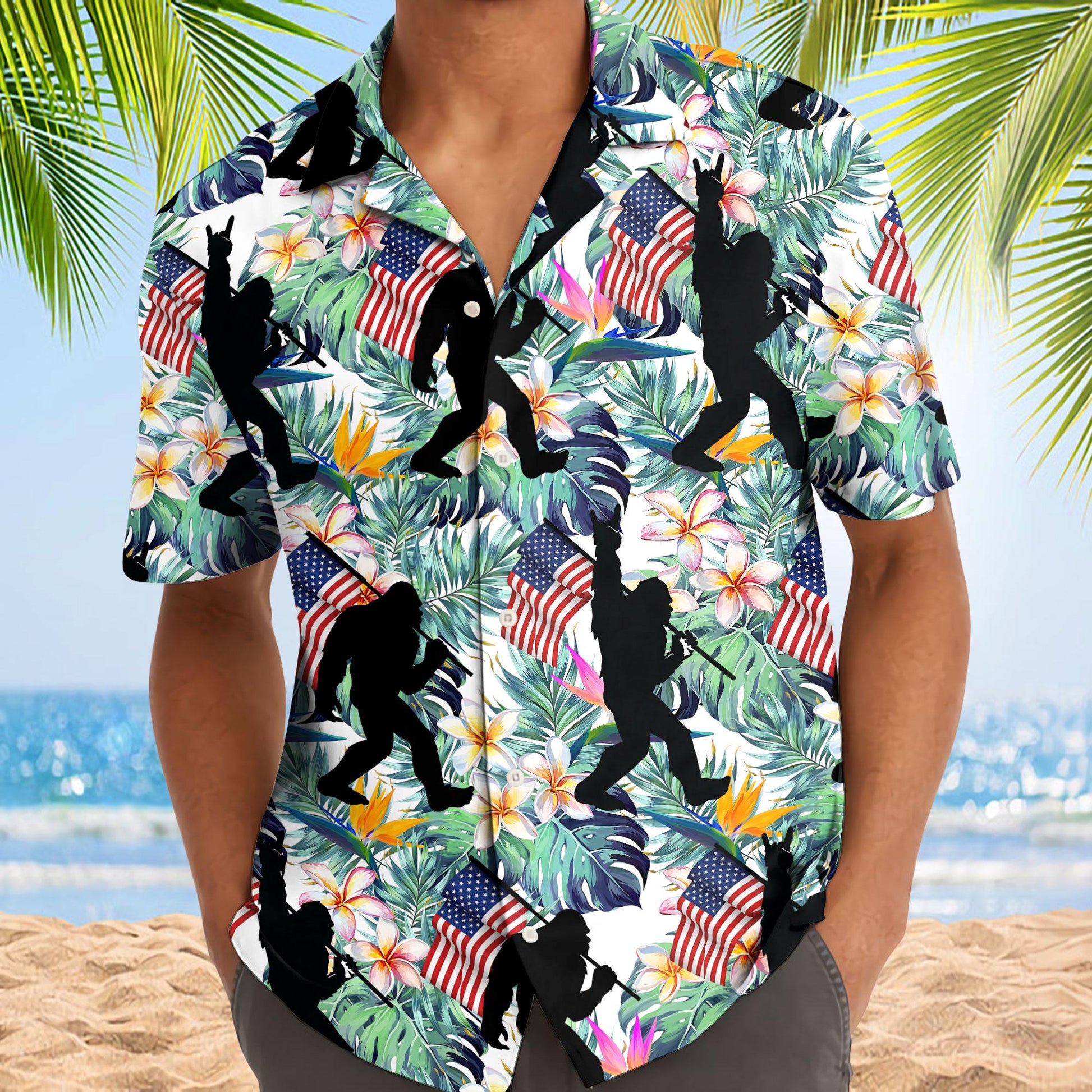 Model wearing the patriotic tropical Hawaiian shirt at the beach