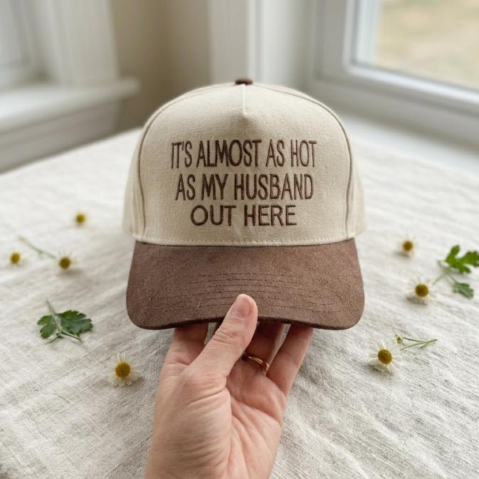 Front view of funny quote trucker cap with light crown and brown bill