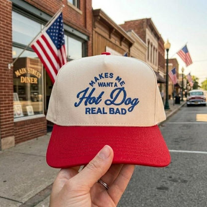 Front view of cream and red two-tone trucker hat with embroidered Hot Dog quote