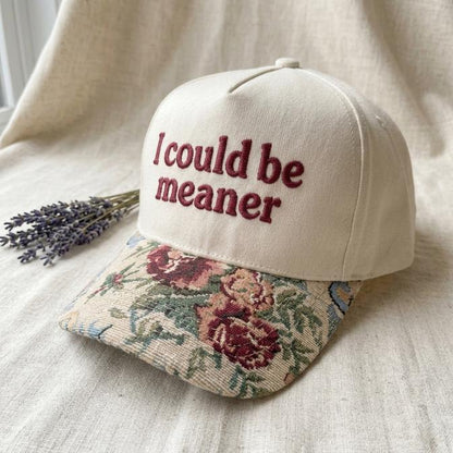 Side angle of embroidered statement hat with vintage floral brim