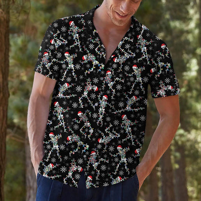 Model wearing a short-sleeve skeleton Santa Hawaiian shirt
