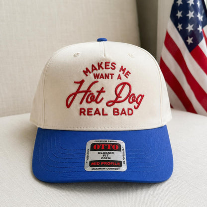 Cream and blue two-tone trucker hat with red embroidered hot dog phrase