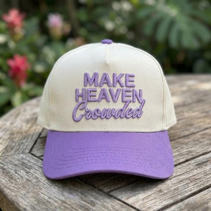 Cream and purple two-tone trucker cap with Make Heaven Crowded embroidery