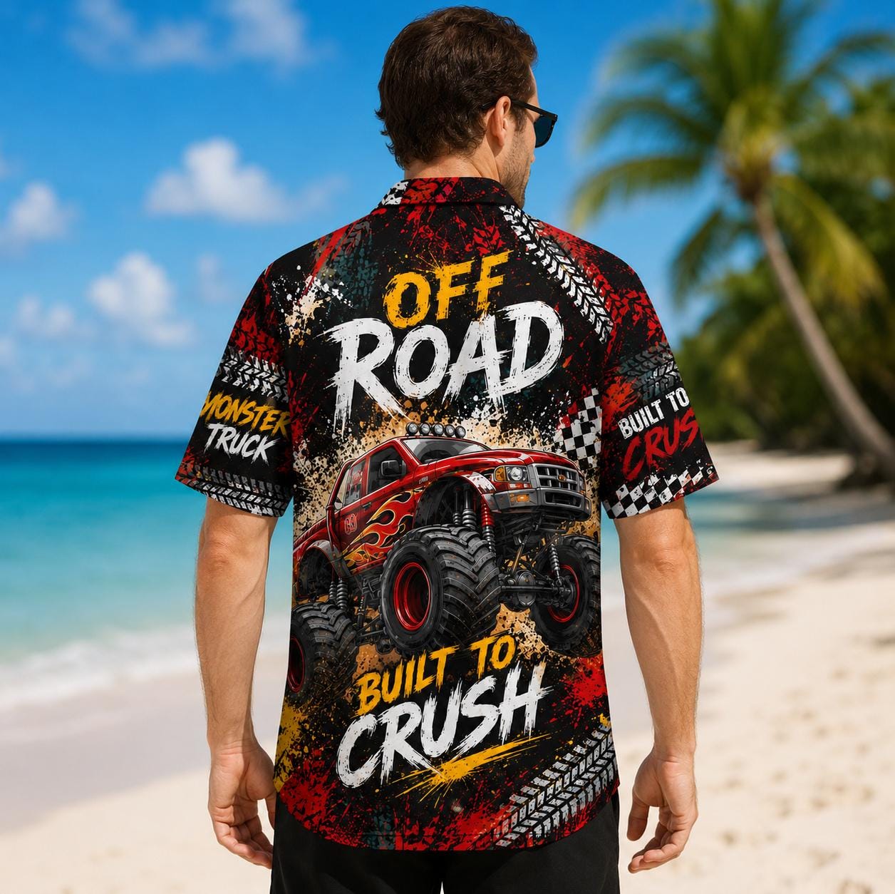 Model wearing the monster truck Hawaiian shirt at the beach, back view