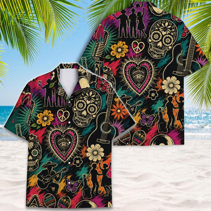 Colorful sugar skull Hawaiian shirt displayed against a tropical beach background