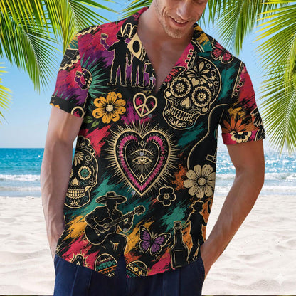Model wearing a colorful sugar skull and guitar Hawaiian shirt at the beach