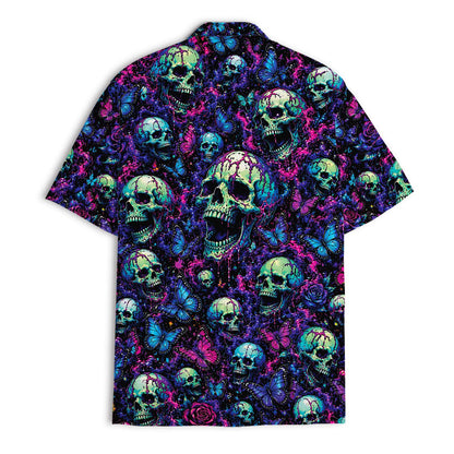 Back view of a neon skull Hawaiian shirt covered in butterflies and roses