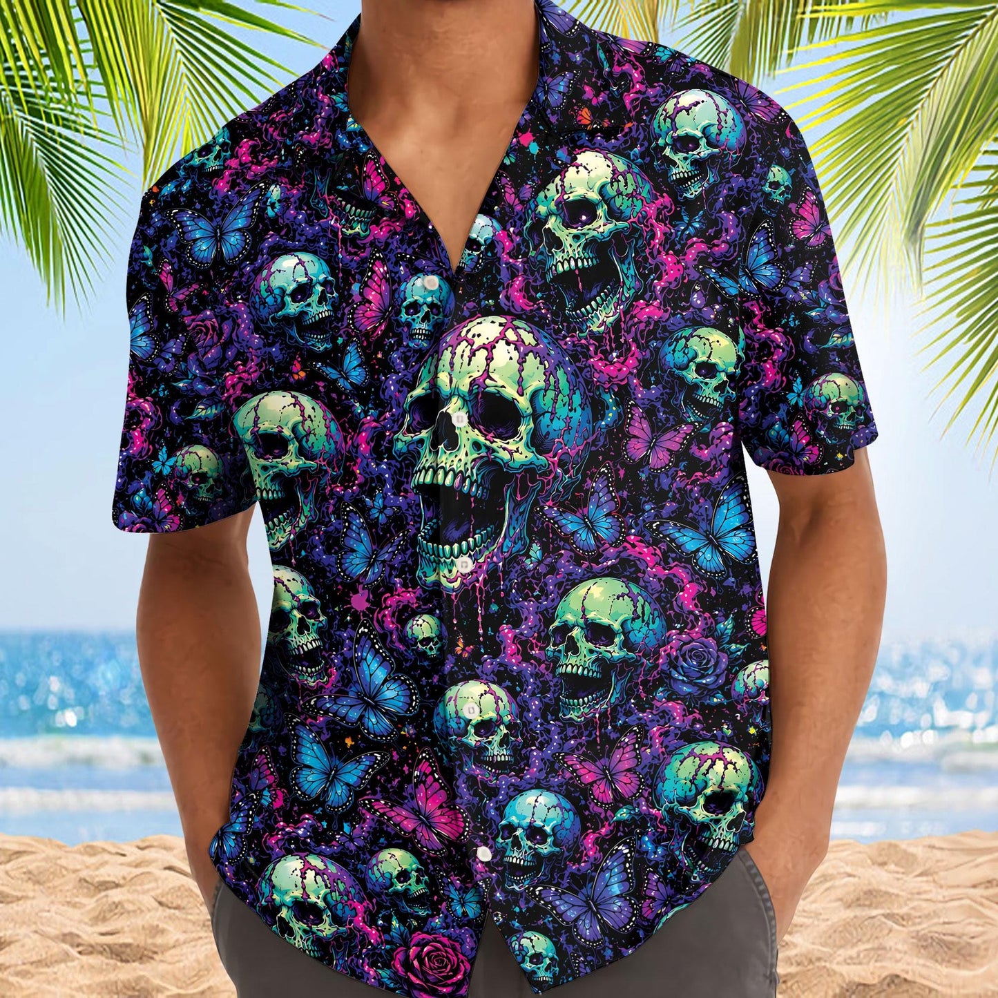 Model wearing a colorful skull Hawaiian shirt at the beach