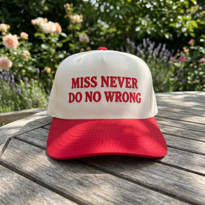Front view of embroidered Miss Never Do No Wrong trucker cap