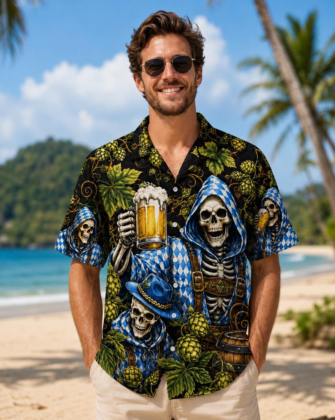 Man wearing a black skeleton Hawaiian shirt with blue reapers, golden mugs, and tropical foliage on a beach