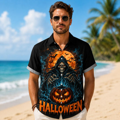 Man wearing the front of a black Halloween shirt with skull, pumpkin, and dripping lettering