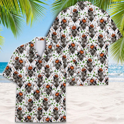 Front view of pumpkin skeleton Hawaiian shirt on a beach backdrop