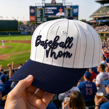 Embroidered Baseball Mom pinstripe hat with a white crown and navy brim at a baseball stadium