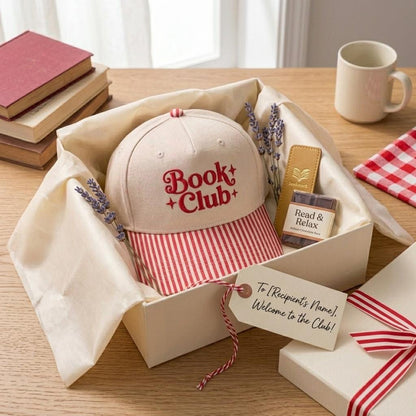 Book Club hat styled in a gift box with books, tea, and reading accessories