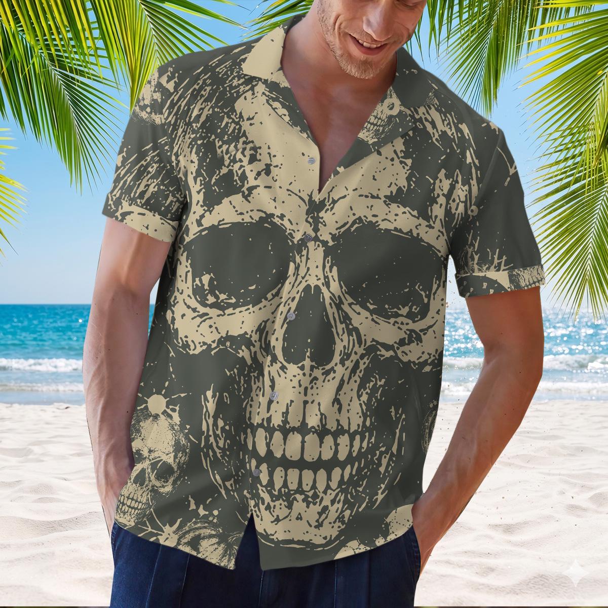 Model wearing charcoal and beige allover skull Hawaiian shirt