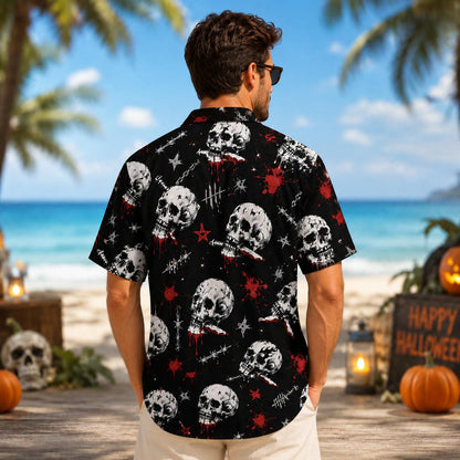 Man modeling the back of a black and red skull print Hawaiian shirt
