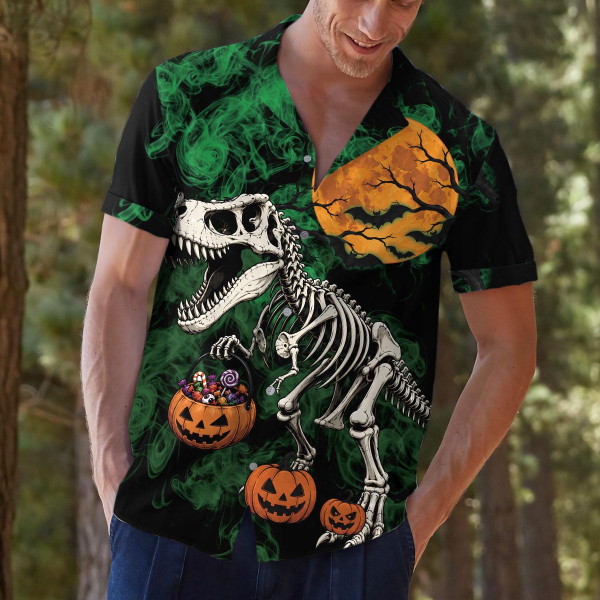 Model wearing the dinosaur Halloween shirt outdoors with its full front artwork visible