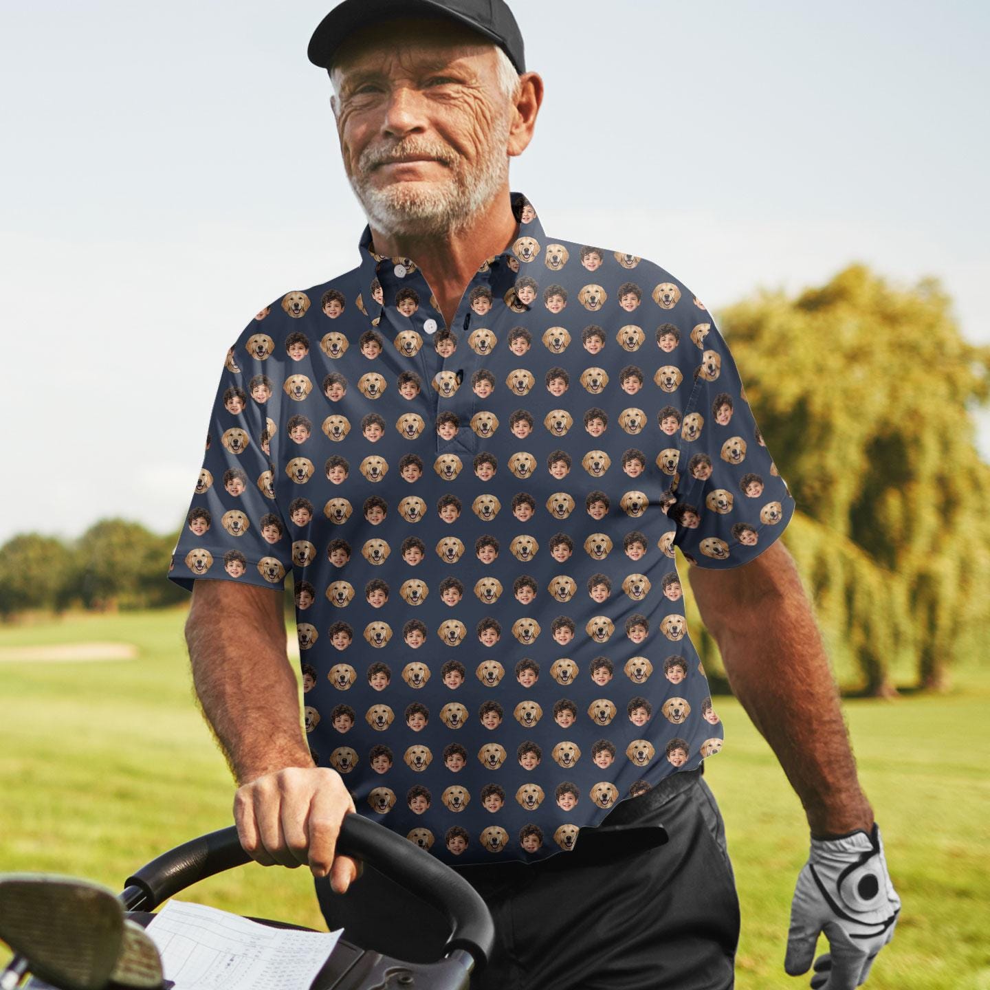 Older man wearing the navy patterned shirt outdoors near a golf course