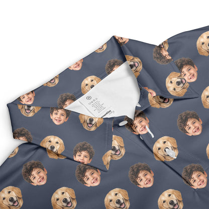 Close-up of the shirt collar and printed child and dog faces on dark navy fabric