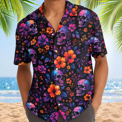 Model wearing a vivid skull floral Hawaiian shirt with button front
