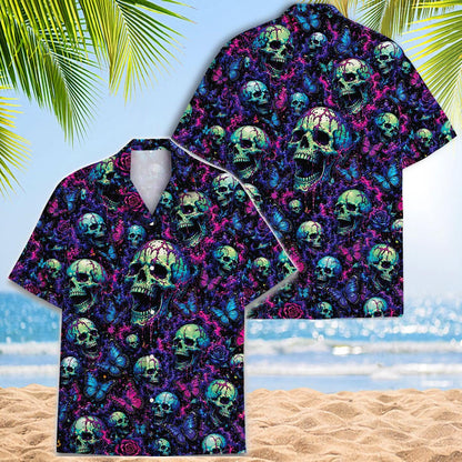 Two views of a skull Hawaiian shirt showing its all-over gothic tropical print