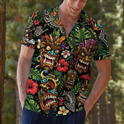 Close lifestyle view of a man wearing a bold tropical Hawaiian shirt