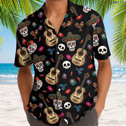 Model wearing a black sugar skull guitar Hawaiian shirt at the beach
