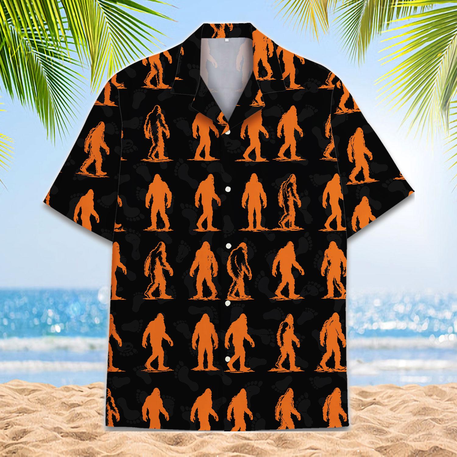 Front view of a black Hawaiian shirt with repeating orange Bigfoot silhouettes