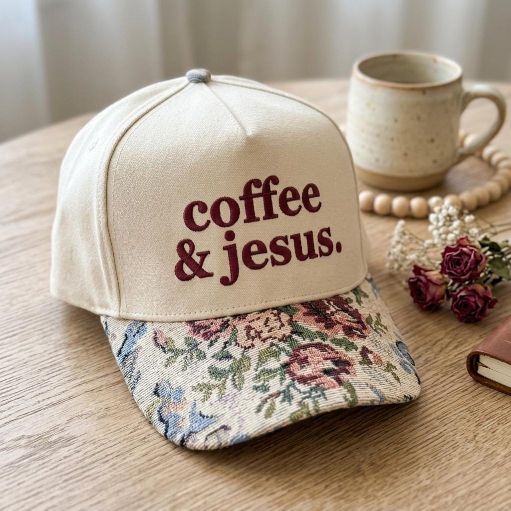 Angled view of Christian message hat showing the floral-patterned curved brim