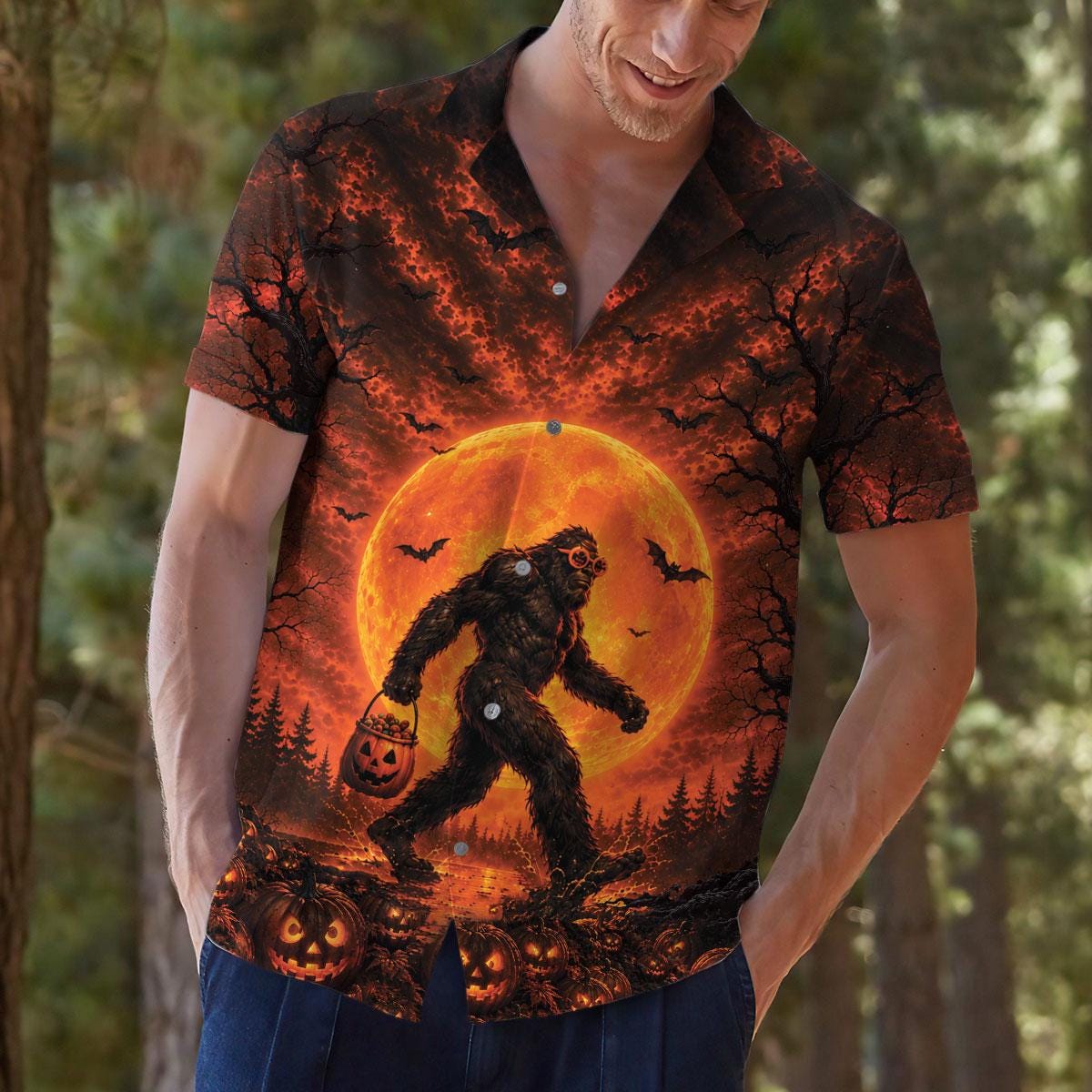 Model wearing orange and black Bigfoot Halloween shirt outdoors