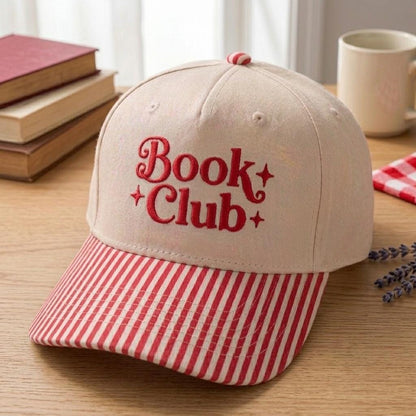Close-up of Book Club embroidered hat with red striped brim