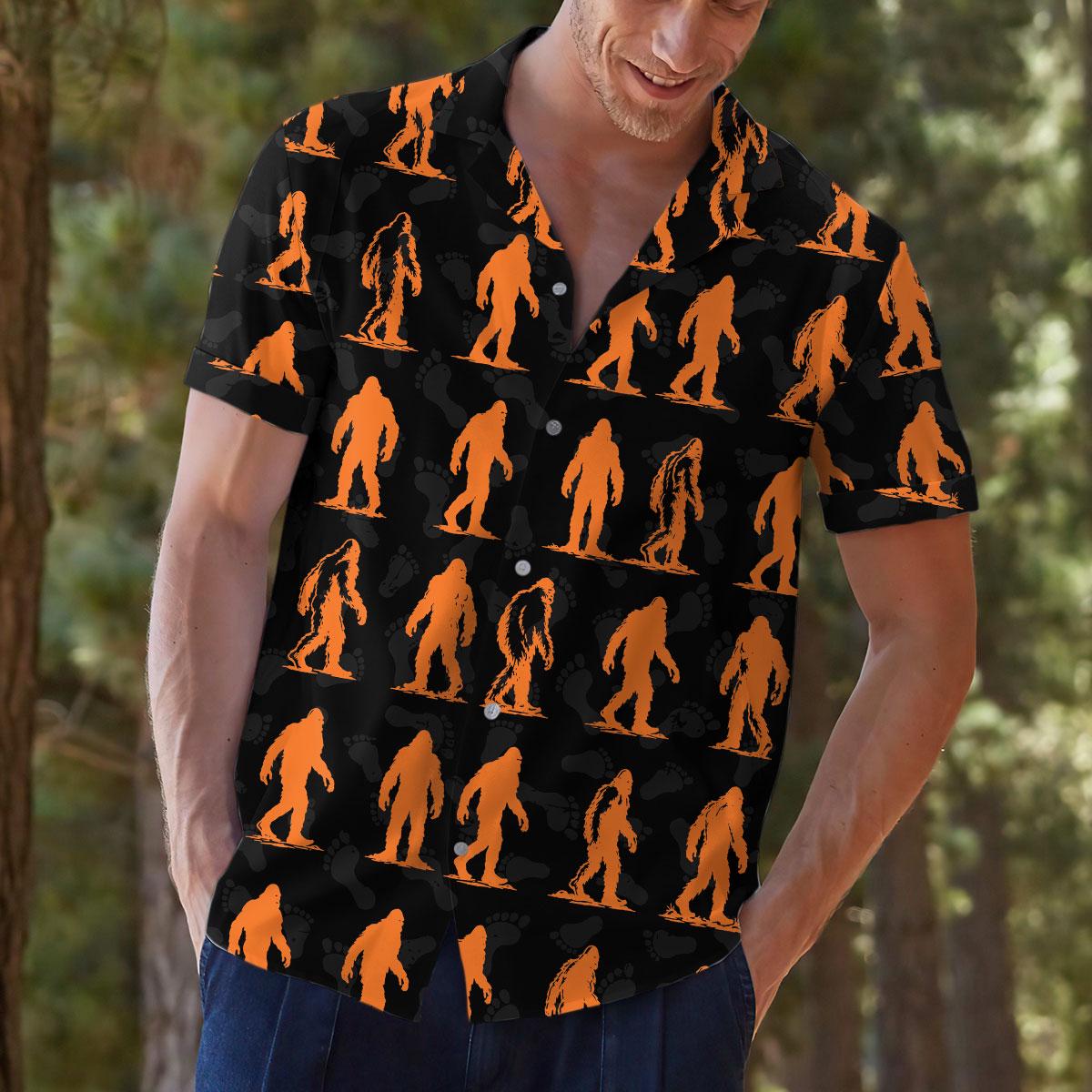 Model wearing the Bigfoot patterned Hawaiian shirt outdoors