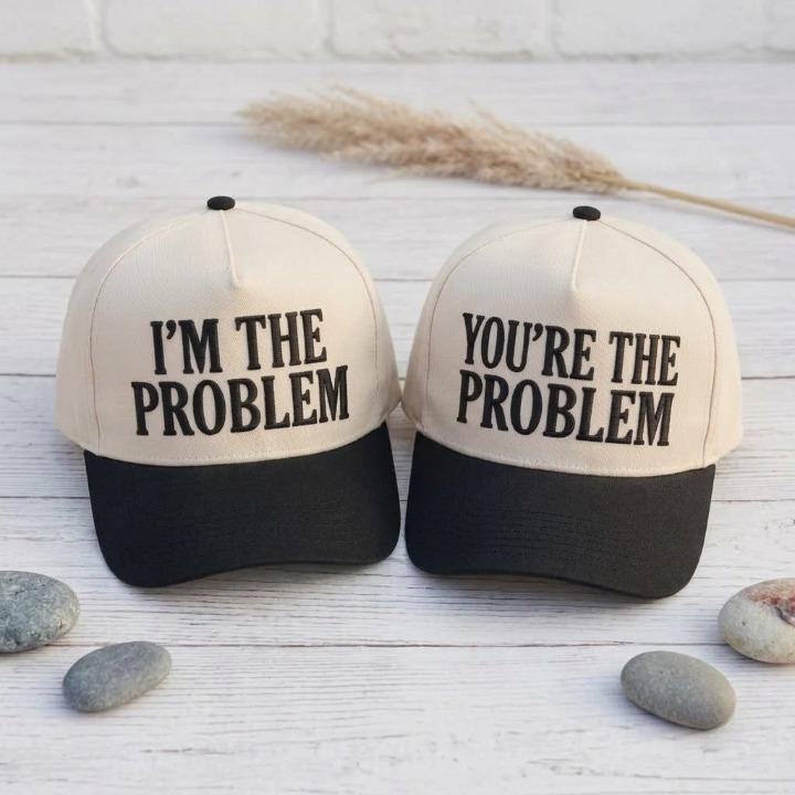 Pair of funny matching trucker hats reading I’m the Problem and You’re the Problem