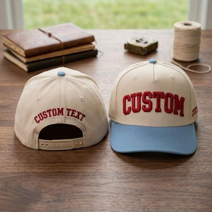 Cream personalized baseball cap with blue contrast brim and adjustable back closure