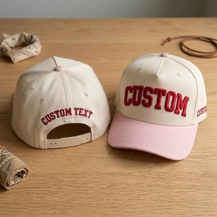 Personalized cream baseball cap with pink contrast brim and matching top button