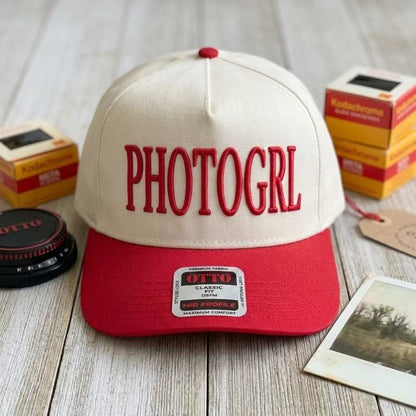Cream and red PHOTOGRL lettering trucker hat front view