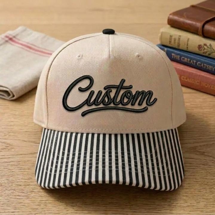 Khaki hat with black Custom script and black striped brim