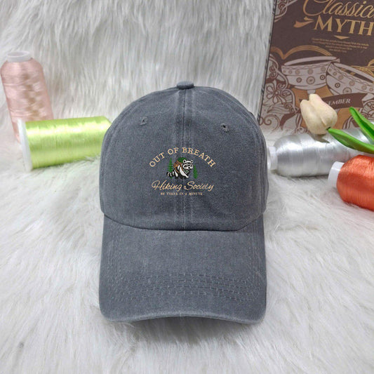 Washed gray dad hat embroidered with tired panda and “Out of Breath Hiking Society” quote – funny gift for hikers
