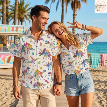 Matching dinosaur print shirts in vibrant colors, worn by a couple at the beach